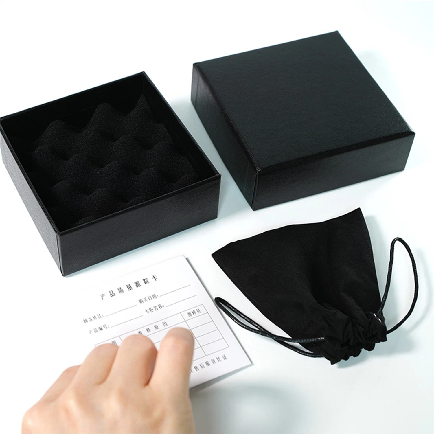 Papel de Leatherette negro Caja de regalo de espuma Insertar papel Tarjeta cordón ajustable Bolsa