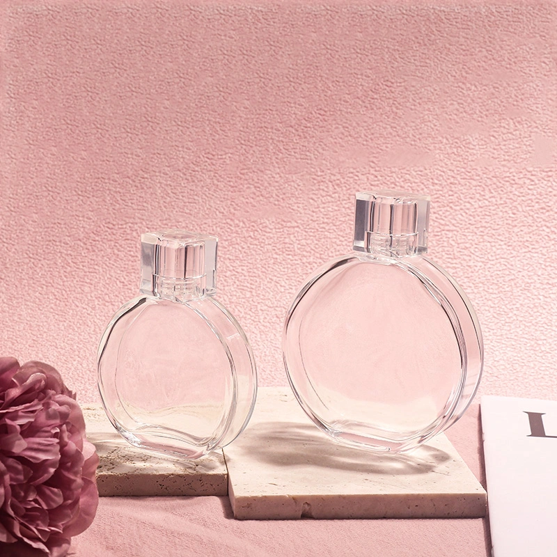 Wholesale/Supplier Grace Round Different Capacity Scent Cosmetics Packaging Glass Perfume Bottle with Lid