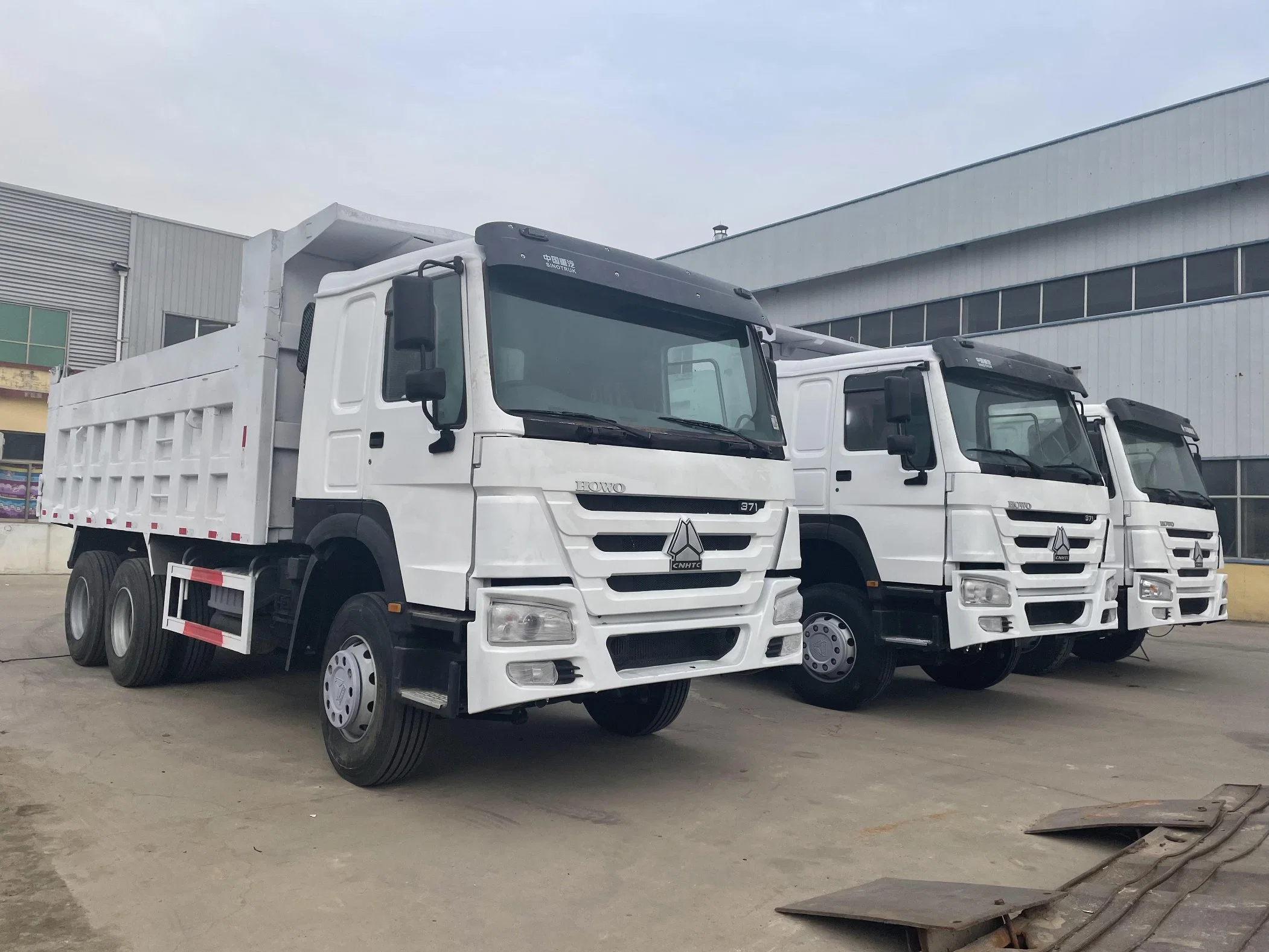 China Hersteller Sino Truck 12 Wheeler LHD 40 Tonnen 8X4 Wird zum Laden von Sandstein HOWO Kipper Dump Truck verwendet