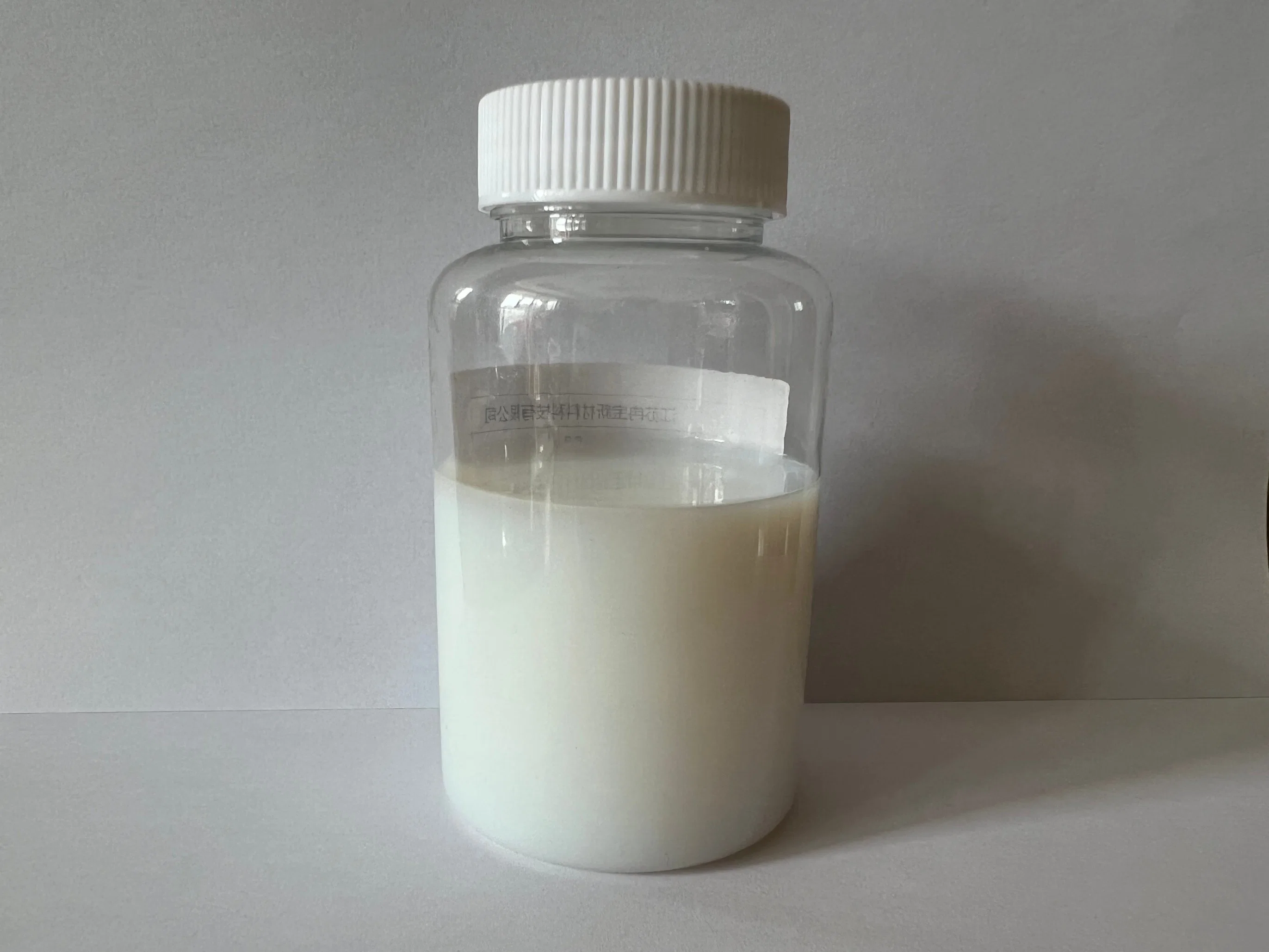 Milky-White Liquid Washable Waterproof Crosslinking Agent JL-107 for Chemical Fiber, Cotton and Their Blended Fabrics