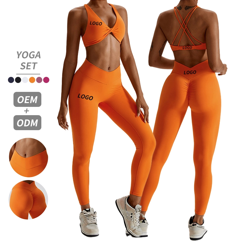 Vêtements de yoga sexy en gros pour femmes, avec dos croisé, adaptés à l'extérieur, à la pratique du Pilates, à la course à pied et au fitness. Ensemble de vêtements de sport pour femmes comprenant un ensemble de yoga pour la salle de sport.