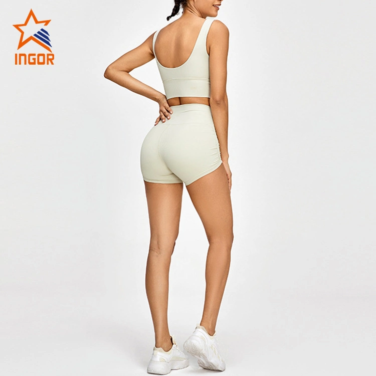 Ingor Sportwear Étiquette privée Activewear OEM ODM Custom Femmes Gym Wear Soutien-gorge de sport et short de cycliste Survêtement Vêtements de sport pour entraînement physique.