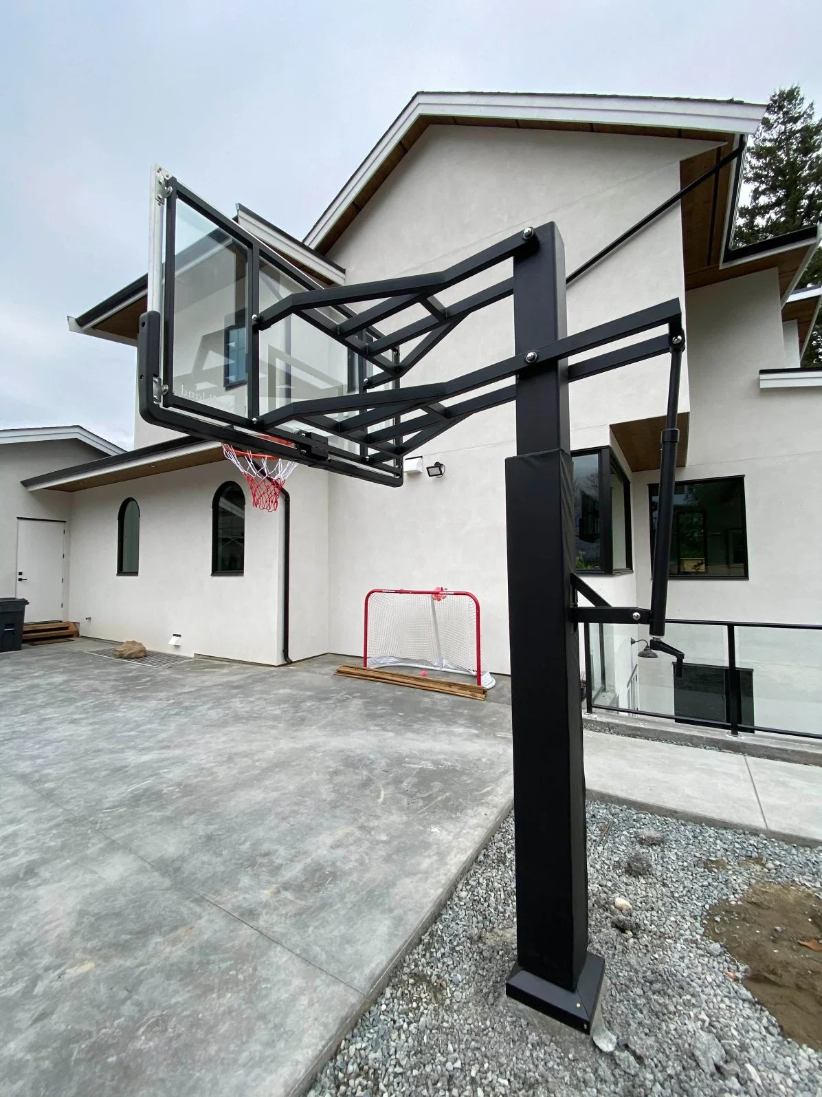 Hot Sale Factory High quality/High cost performance Black Hydraulic Basketball Pole Manual Hydraulic Removable Basketball Hoops Stand Exported