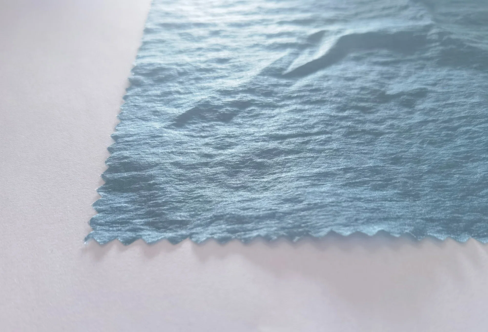 Novo tecido de película de nylon para fibra de tafetá Ribstop para criar Casaco