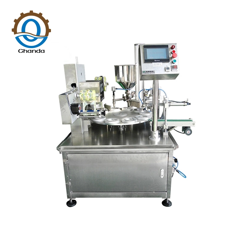 Machine de remplissage de film de remplissage de cuillère rotative au miel/remplissage de pâte de cuillère en plastique Machine d'emballage de film d'aluminium