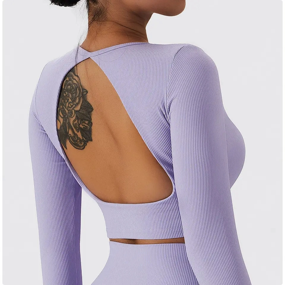 Vêtements de sport pour femmes ensembles de yoga poches ensemble d'entraînement sans couture 2 pièces Hauts d'exercice à manches longues et côtes leggings de yoga actif Costume