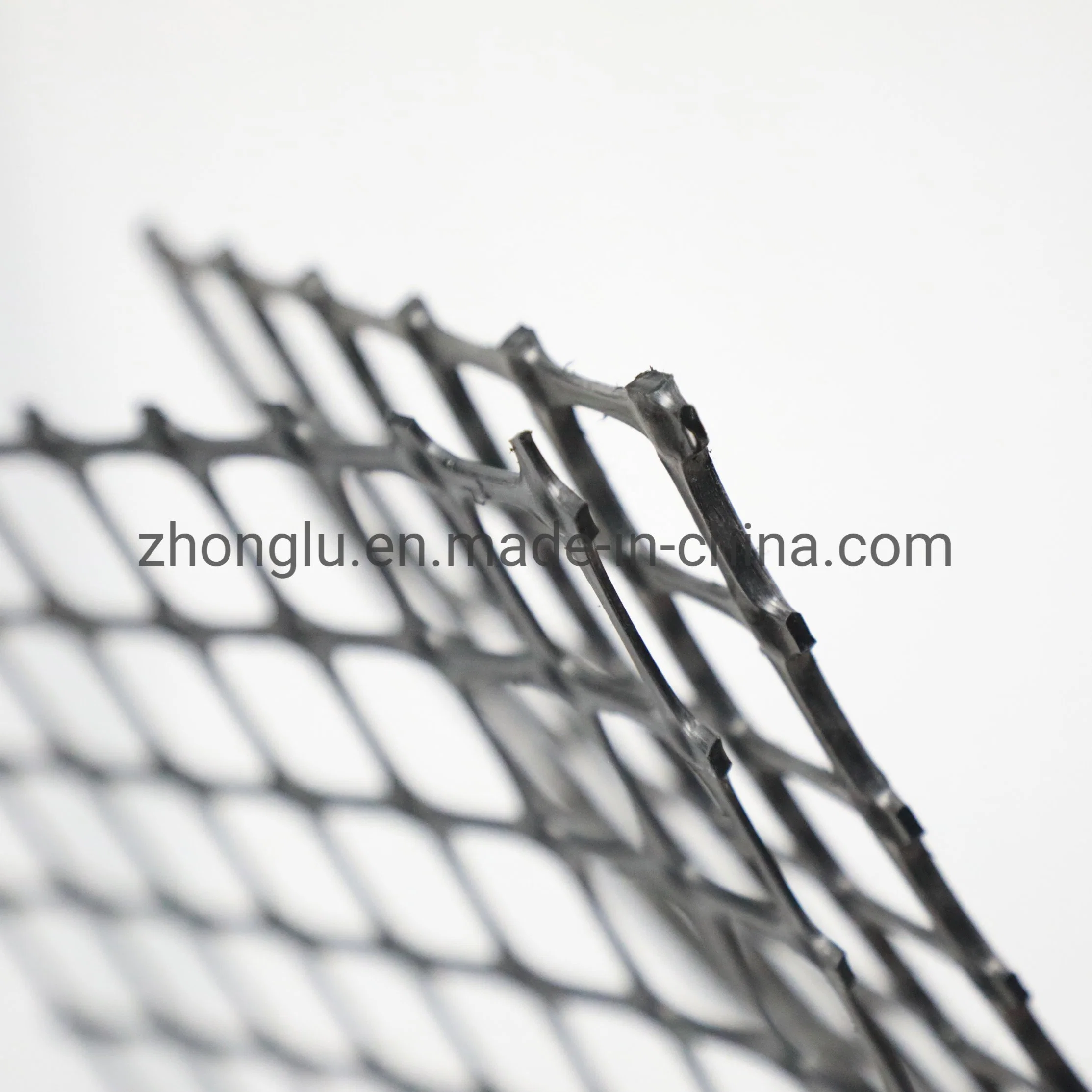 البلاستيك PP Biaxial Geogrid Polyester Gogrid السعر لتربة الطريق جهاز التثبيت