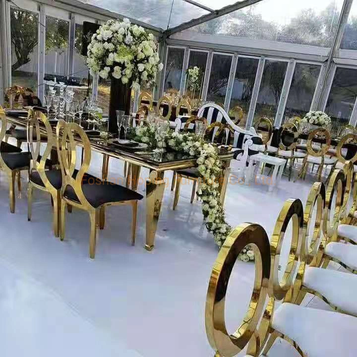 Chaise de salle à manger Chiavari de banquet de mariage de restaurant en métal doré de luxe en acier inoxydable empilable à dossier rond pour table de salle à manger de banquet d'hôtel classique.