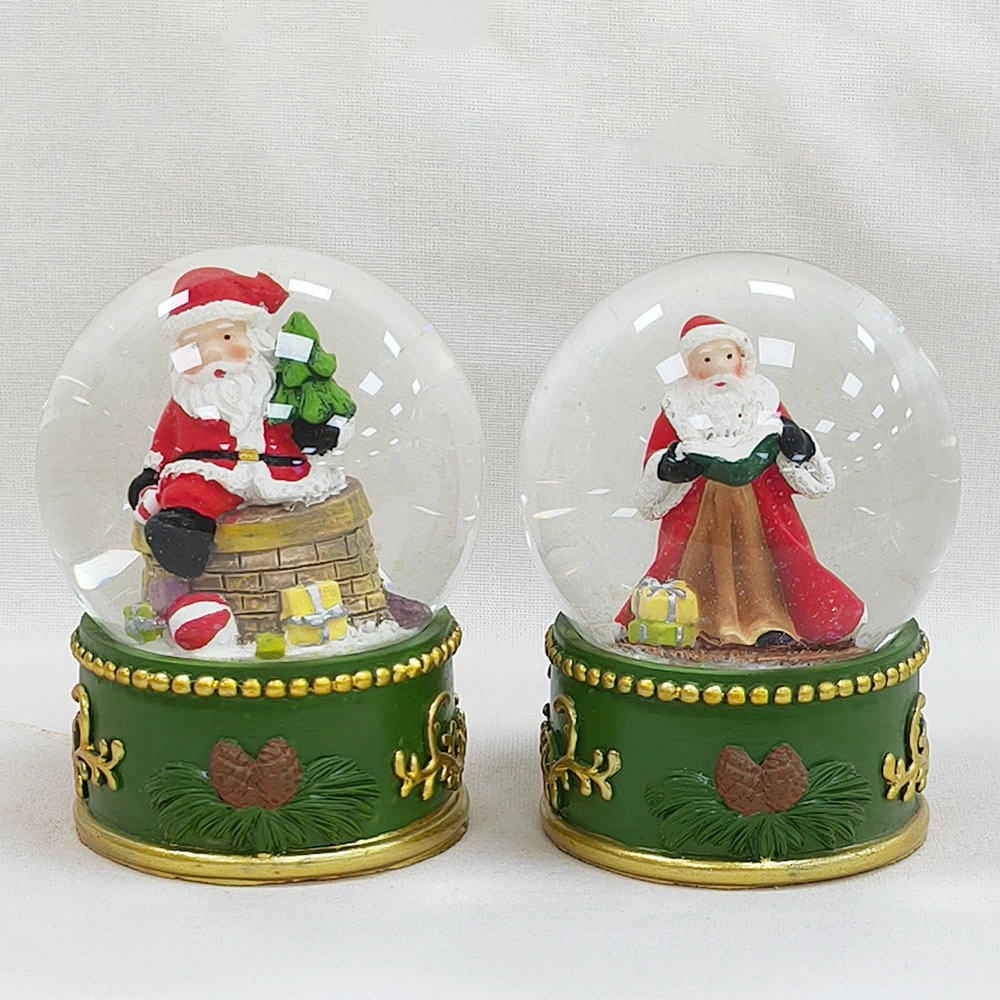 Novo presente de dia infantil da caixa de música Crystal Ball da resina de chegada Engraçado Natal Natal Natal Custom Snow Globos