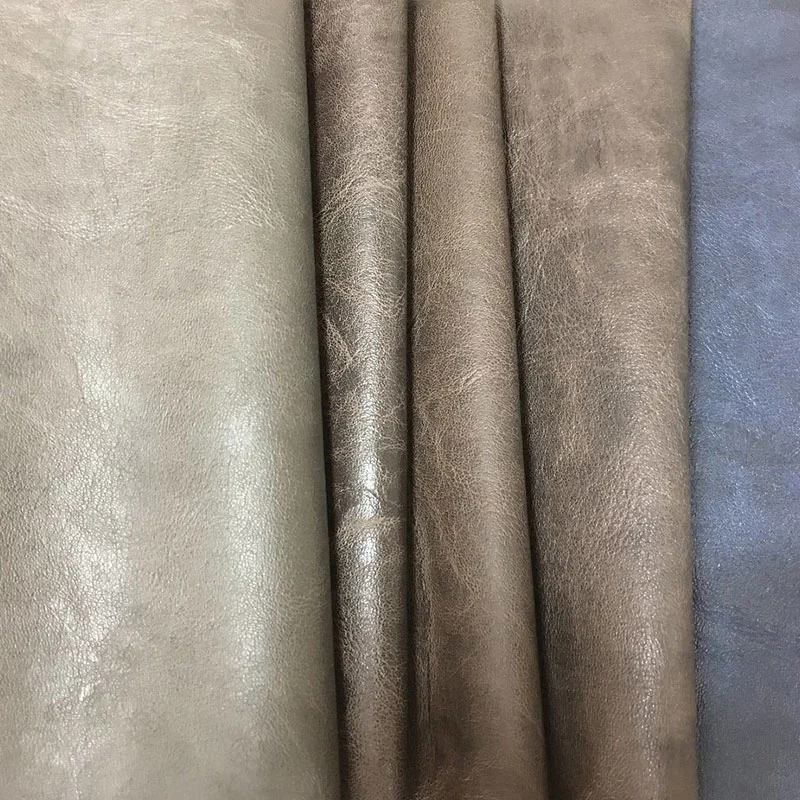 Venta en caliente Home Textil PVC Faux PU Garment Rexine Artificial Tela sintética de cuero para el sofá de la silla Muebles chaqueta - sola