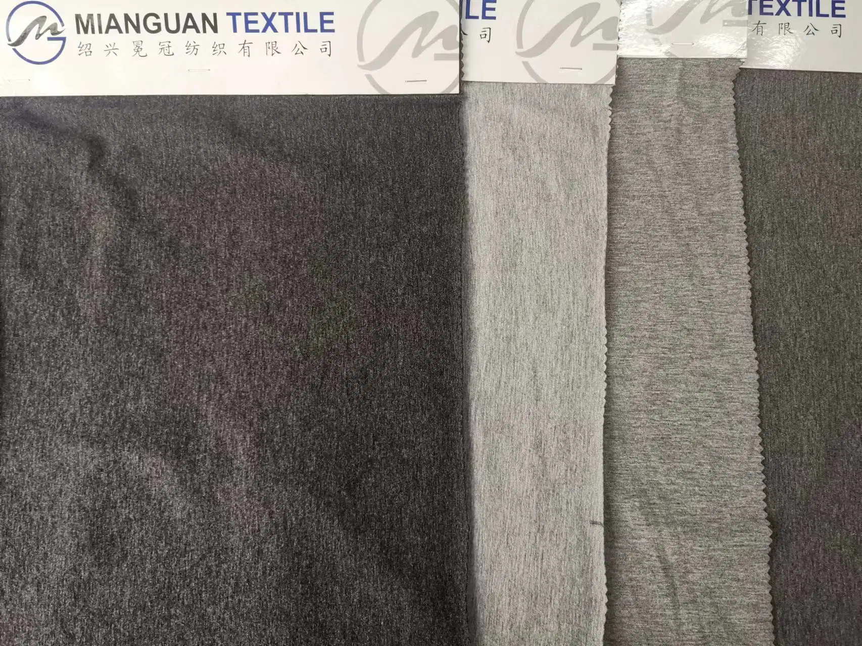 Melange Style Stock Lot Textile 32s 65%Polyester 35%Cotton with Stretch Cotton Jesery 210GSM Plain Dyed Knitted Fabric for Sport Cloth Garment