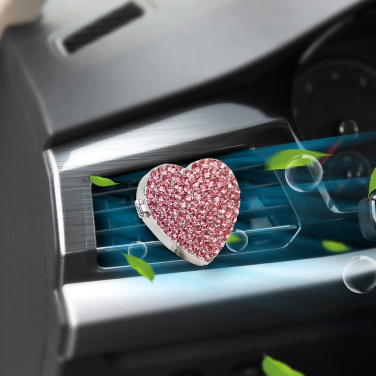 Forma de corazón con tubo de ventilación de aleación Mini Car Perfume