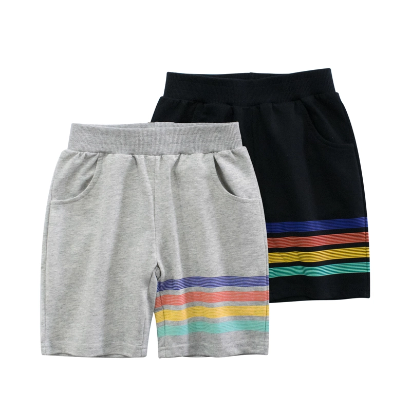 Shorts d'été décontractés confortables avec bande élastique en coton lavé pour garçon, rayures blanches sur la ceinture.