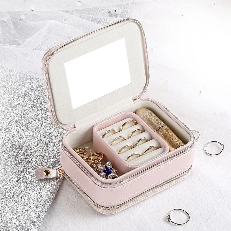 China Portable Velvet Ring Jewelry Storage Cases for Locking Wholesale/Supplier Custom Travel Bracelet Necklace Jewelry Organizer Box Wholesale/Supplier Pink White Jewelry Box
