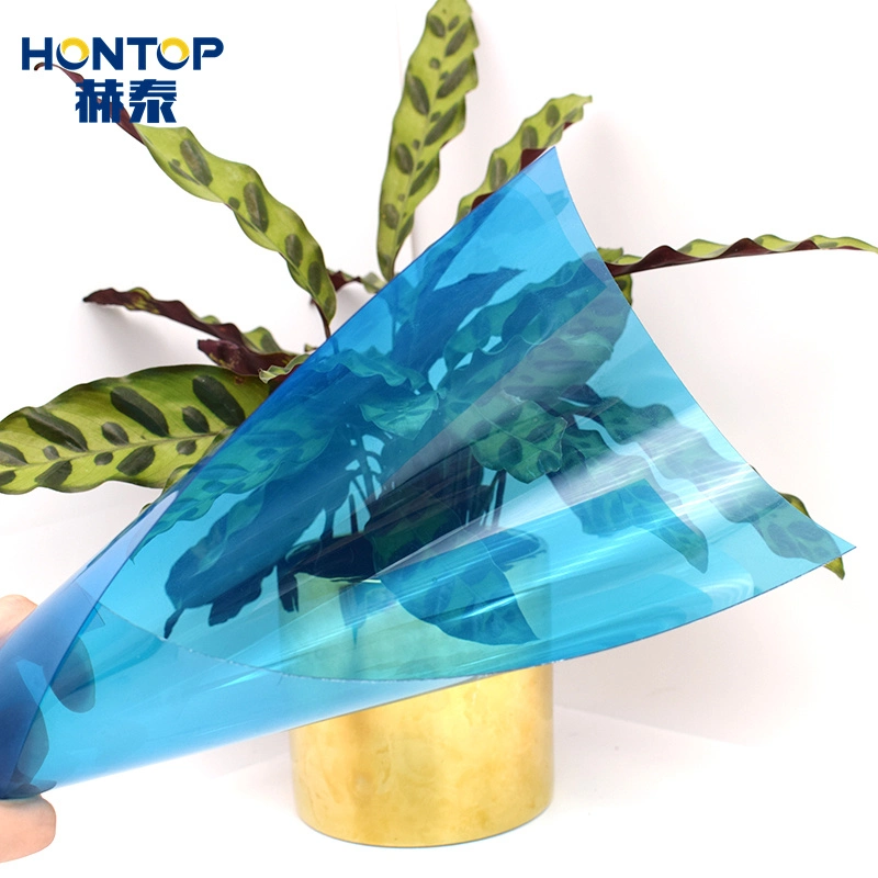 PVC Blue and Transparent High Glossy Shrink Stretch Wrapping Plastic Laser Cutting Blister Candy Package China PVC Film