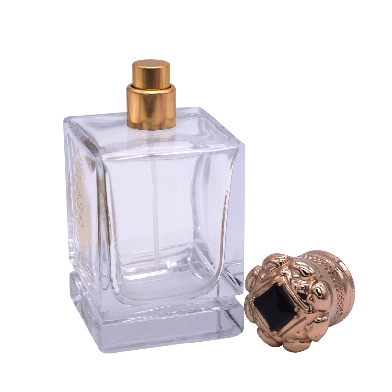 Manufacture Customized Wholesale/Supplier Unique Shape Perfume Glass Bottle with Special Lid