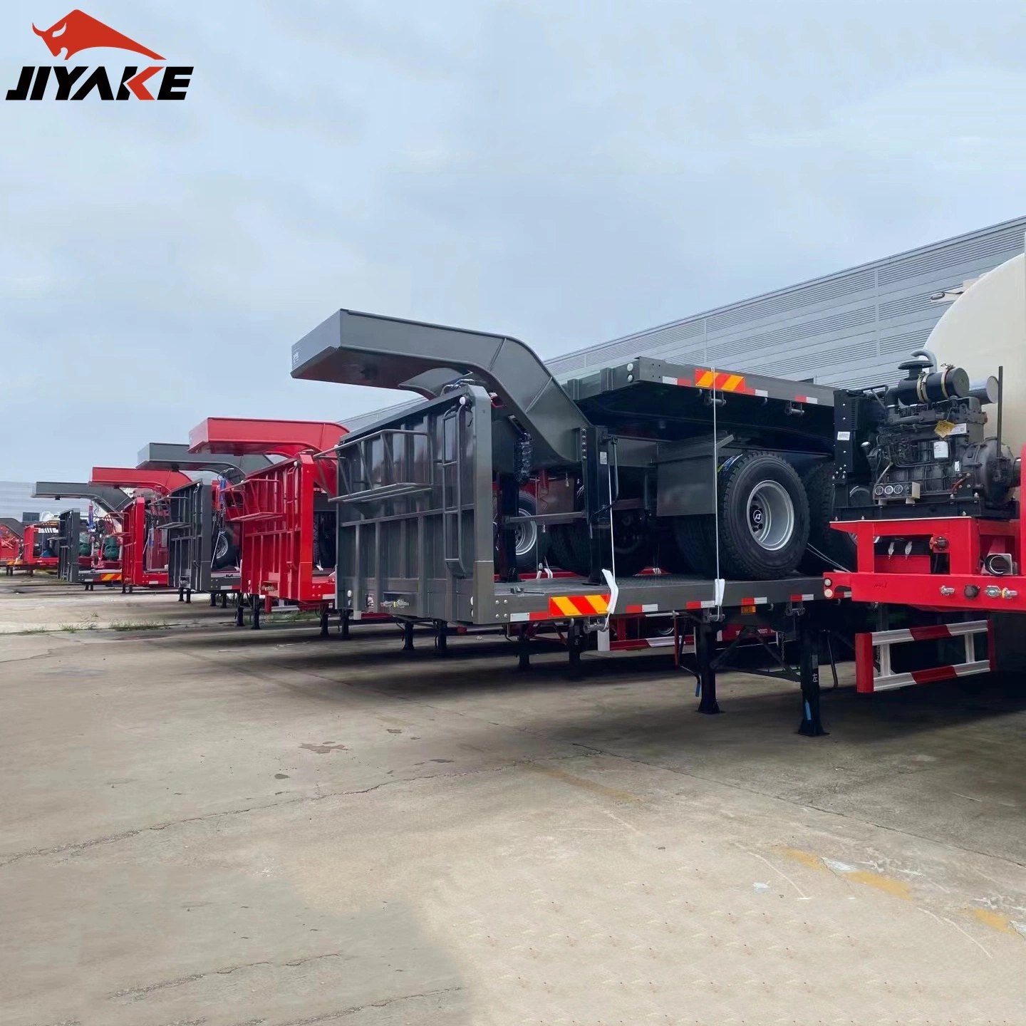 40 60 100 Ton Heavy Duty 3 Axle 4 Axle Low Flatbed Loader Deck Lowboy Trailers Lowbed Semi Trailer with Ramps