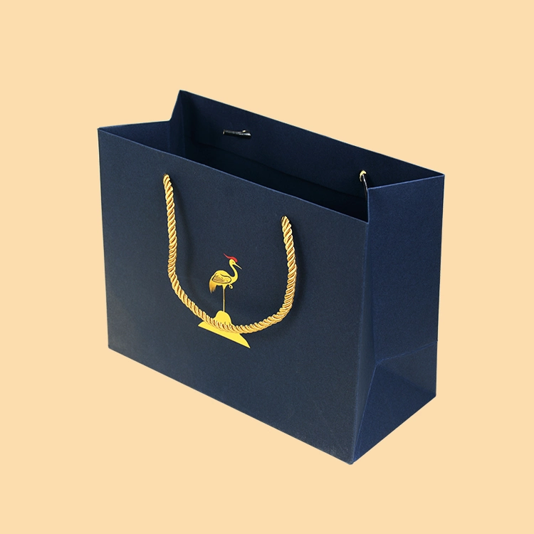 La promoción personalizada Bolsa de compras lámina caliente Logo noble papel azul Bolsa con asa de 38cm