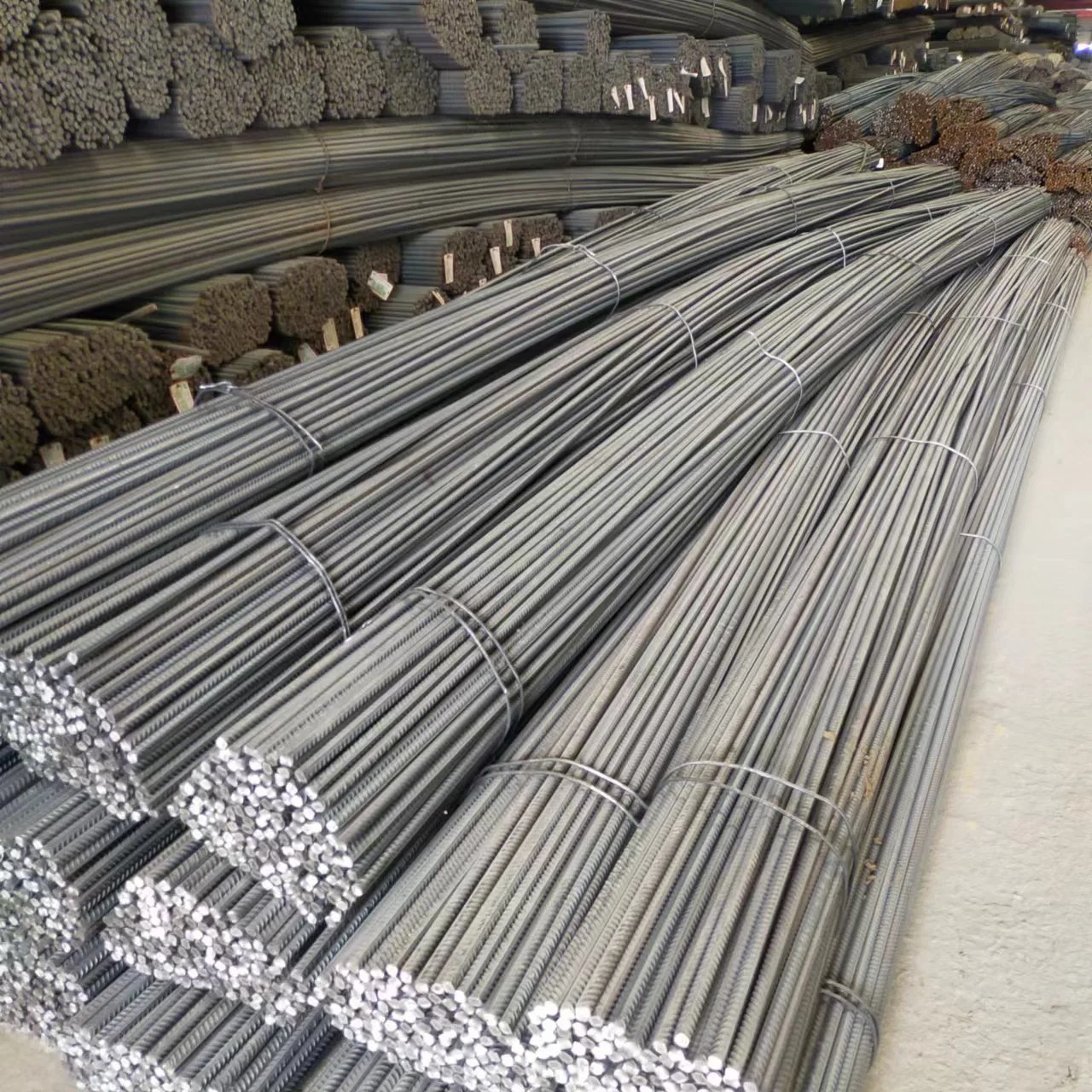 ASTM A615 Grade40 60 SS400 S355 HRB335 HRB400 HRB500 verformt Edelstahl Stäbe Carbon Steel Bar Hersteller Verstärkung Stahl Rebar