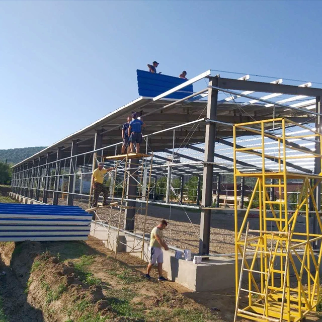 Hangar de prefabricados de estructura de acero galvanizado laminadas en caliente Almacén Cobertizo con bastidor de la sección H parte