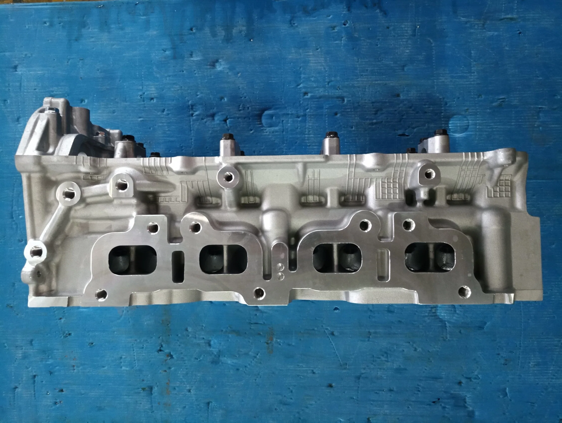 Milexuan Auto Engine Part Cast Iron Auto Accessories Qr25 Qr20 Cylinder Head 110405X00A for Nissan Cabstar Np300 Pickup (D22) 2.5dci