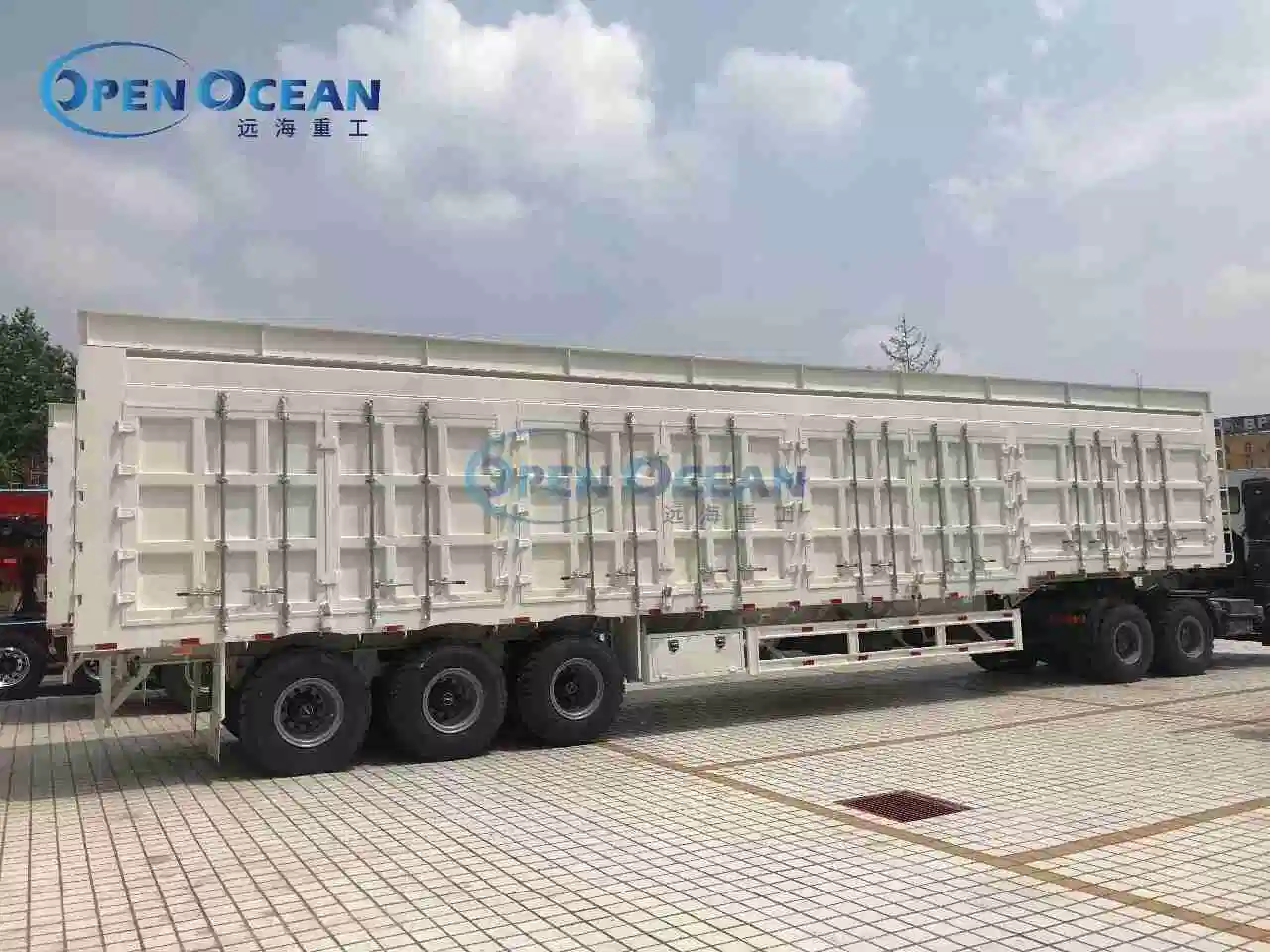 Venta caliente Tri Axle Dropside Board Transporte de grano a granel Semi Remolque para camiones