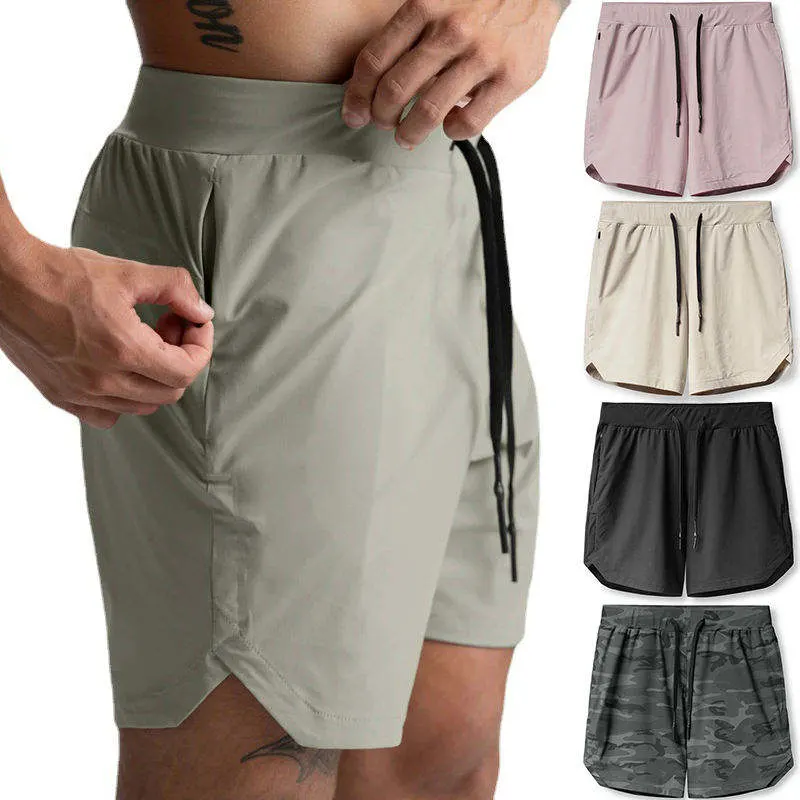 Shorts de sport pour hommes personnalisés en polyester avec poche intérieure, séchage rapide, idéaux pour le gymnase, la course à pied et les activités sportives.