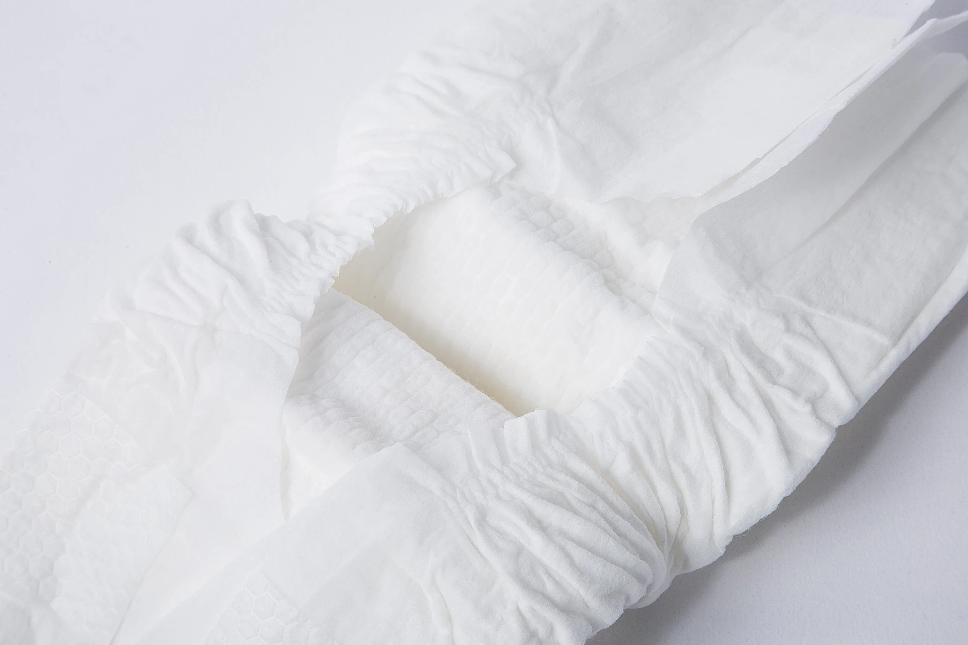 Couche bébé en coton à absorption élevée et ruban Magic à usage unique avec bon Prix OEM ODM Personnaliser échantillons gratuits promotion Refasten pour bébés et tout-petits