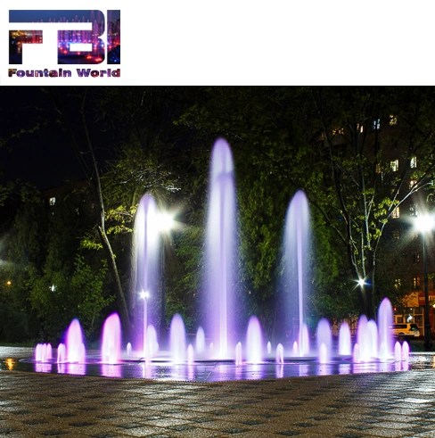 Fontaine d'eau dansante colorée et décorative en plein air avec un motif en matrice musicale.