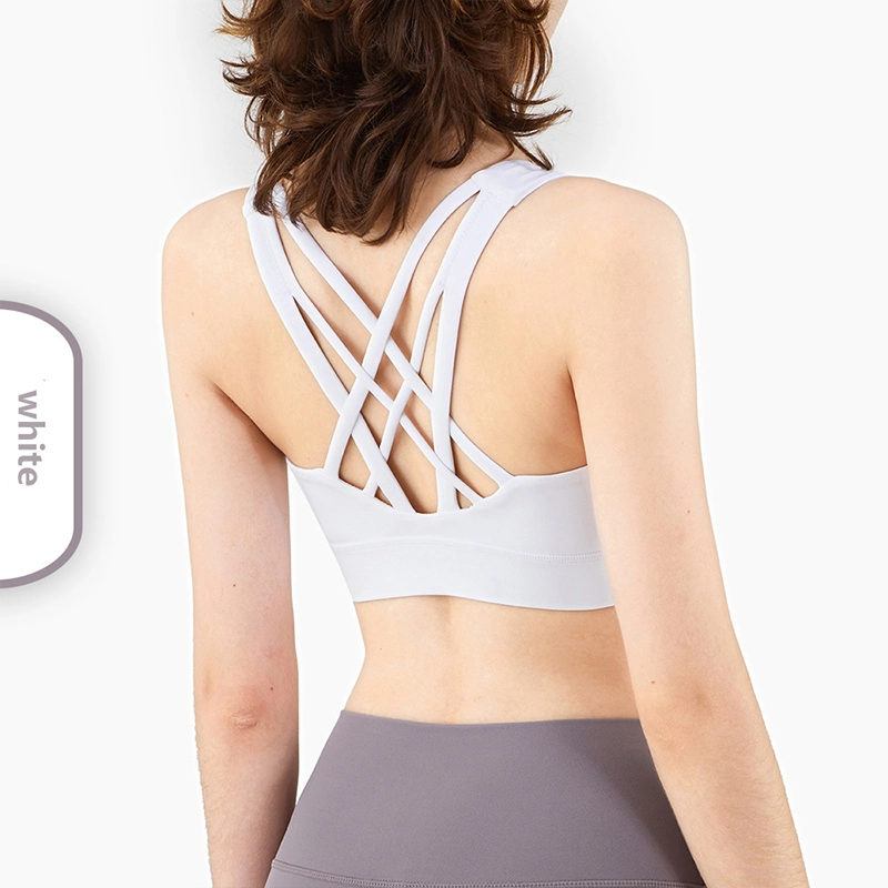 Acolchado de Strappy OEM Bra deporte para las mujeres sostén deportivo Logotipo personalizado de Yoga Deportes Mujer Push up Bra Top para gimnasio