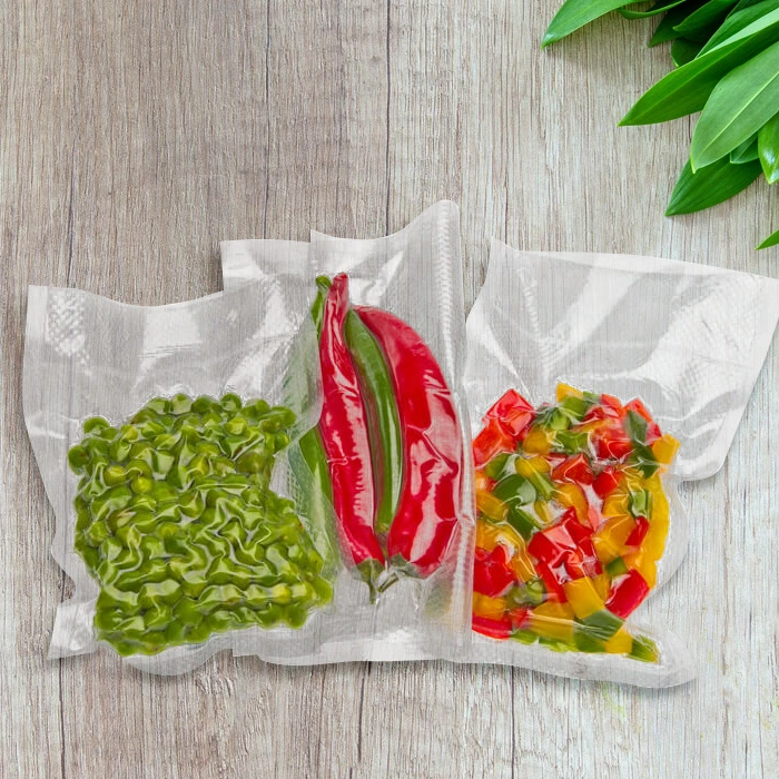 Bolsa de almacenamiento al vacío con sello de tres lados de nylon libre de BPA, compostable, biodegradable y con relieve para carne y alimentos congelados.