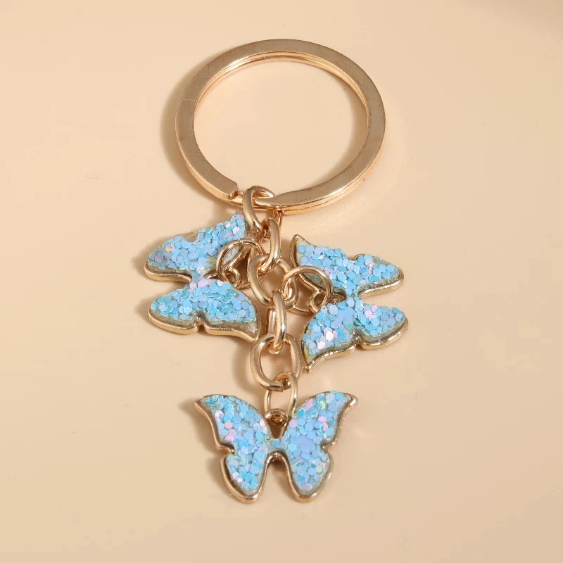 Muestra gratuita de Cute de color mariposa Key Ring esmaltado volando Cadenas de llaves de animales