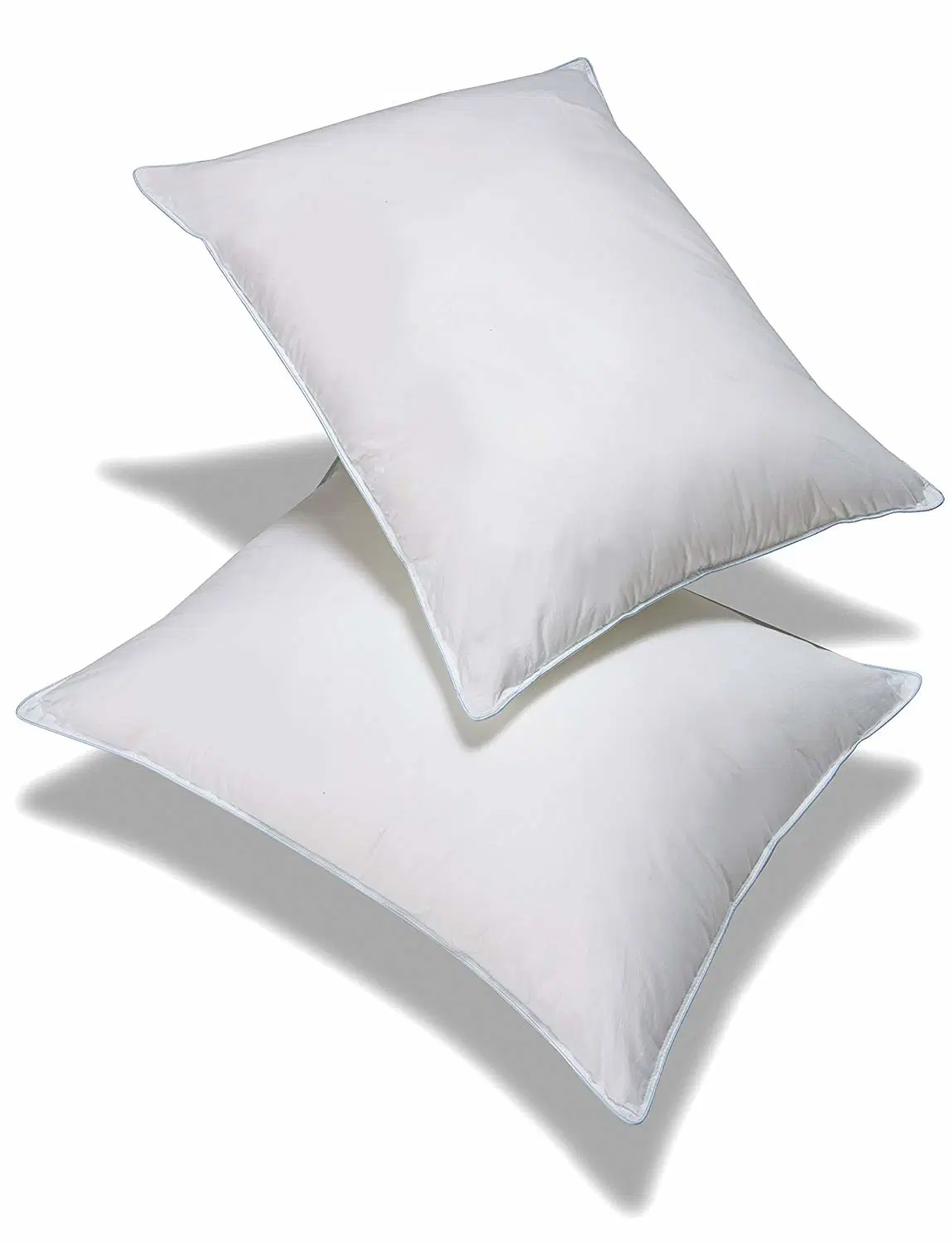 Coussin d'hôtel blanc pour dormir avec un rembourrage en fibres de polyester en forme de boule.