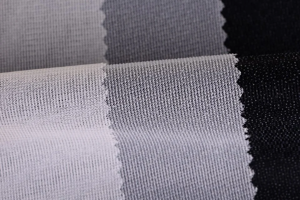 Wholesale/Supplier Polyester Overcoat Woven Interlining Fabric for Uniform Suit Robes Jackets