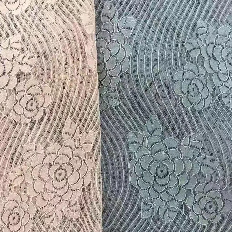 Großhandel Mode Polyester Spitze Stoff Gestrickte Qualität Rind Korn Muster Geschäumtes Jacquard-Spitzenkleid Stoff für Bekleidung