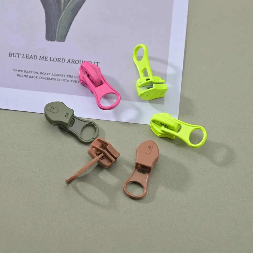 Small 5# High Popular Rack Plating Colored Thumb Slider Zipper Pull Head Custom Logo Available