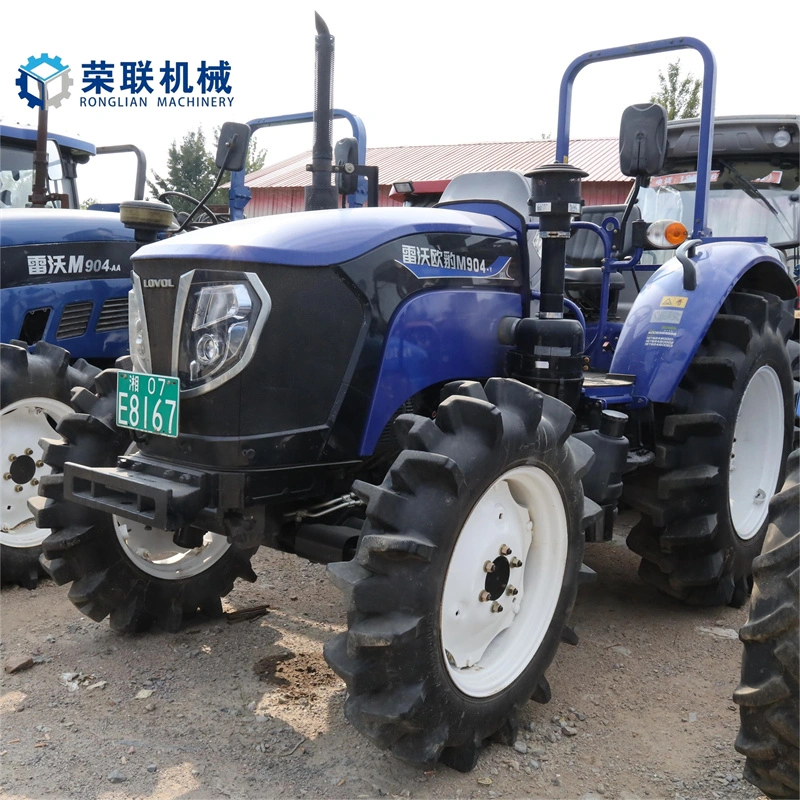 Tracteur agricole d'occasion Yto Foton Lovol avec chargeur et équipements.