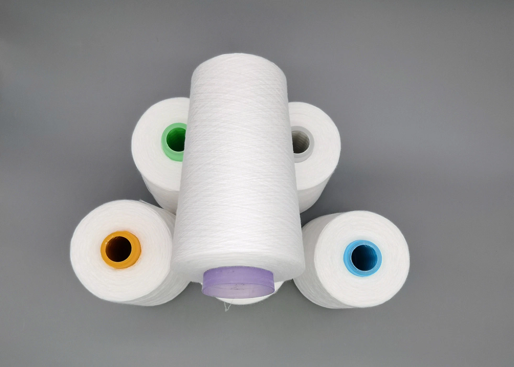 Polyester Thread Yarn 40/2 Micro Polyester Spun Yarn 20/2 Heat Set PP Sp 40/3 Sewing Thread Weaving Polyester Yarn 50/2