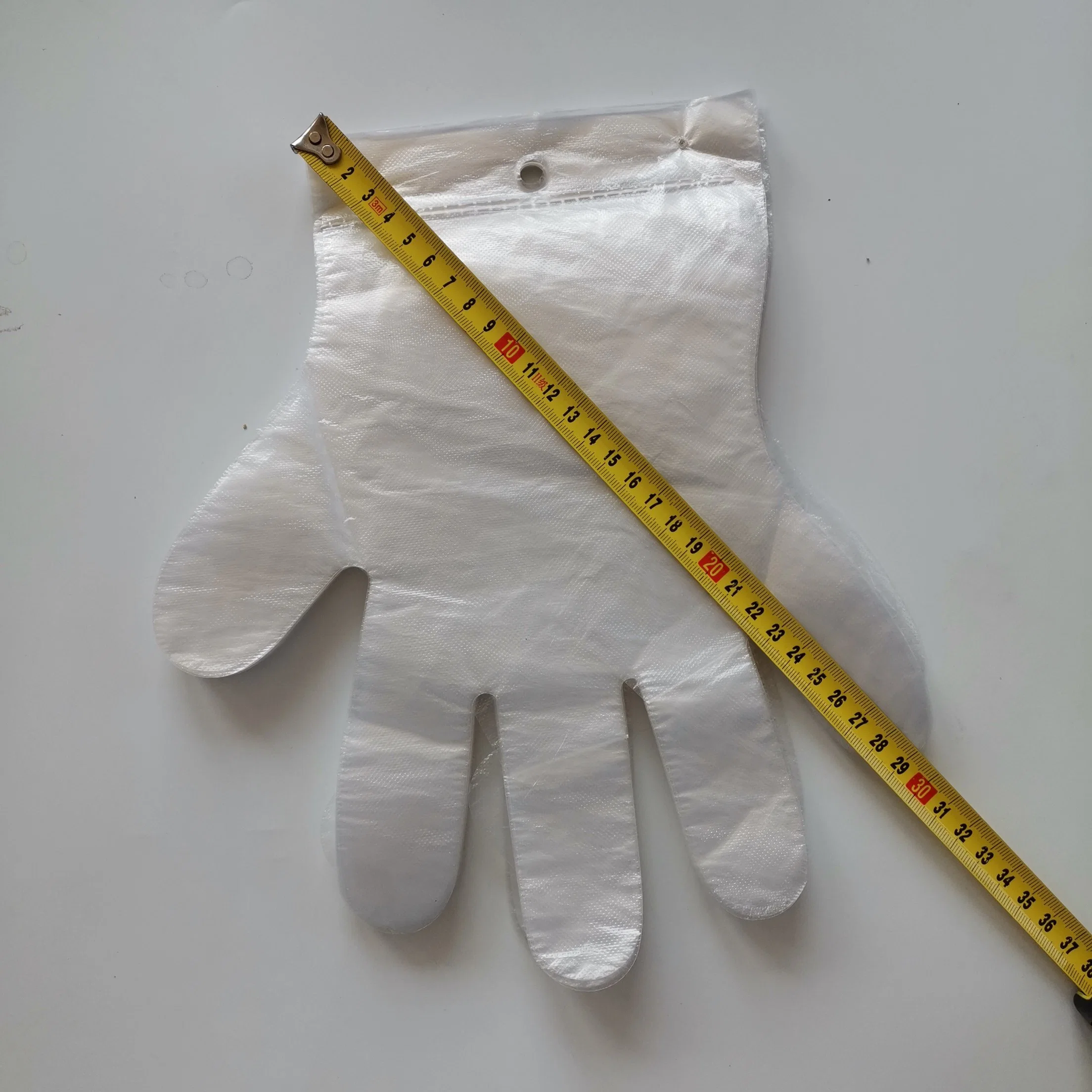 0.7g Gloves Hot Sale Standard Size Disposable HDPE Plastic White Color Cleaning Gloves with Break Point and Hole
