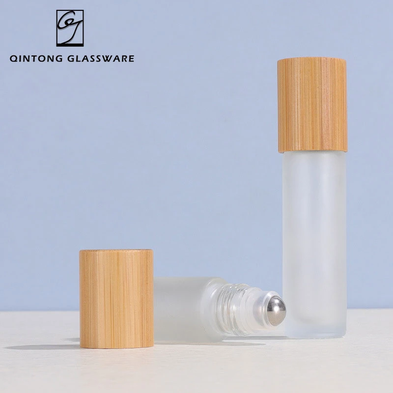 Factory Price 5ml 10ml 15ml Environmentally Friendly Matte Glass Cosmetics Packaging Perfume Glass Essential Oil Bottle with Bamboo Lid and Roller Ball