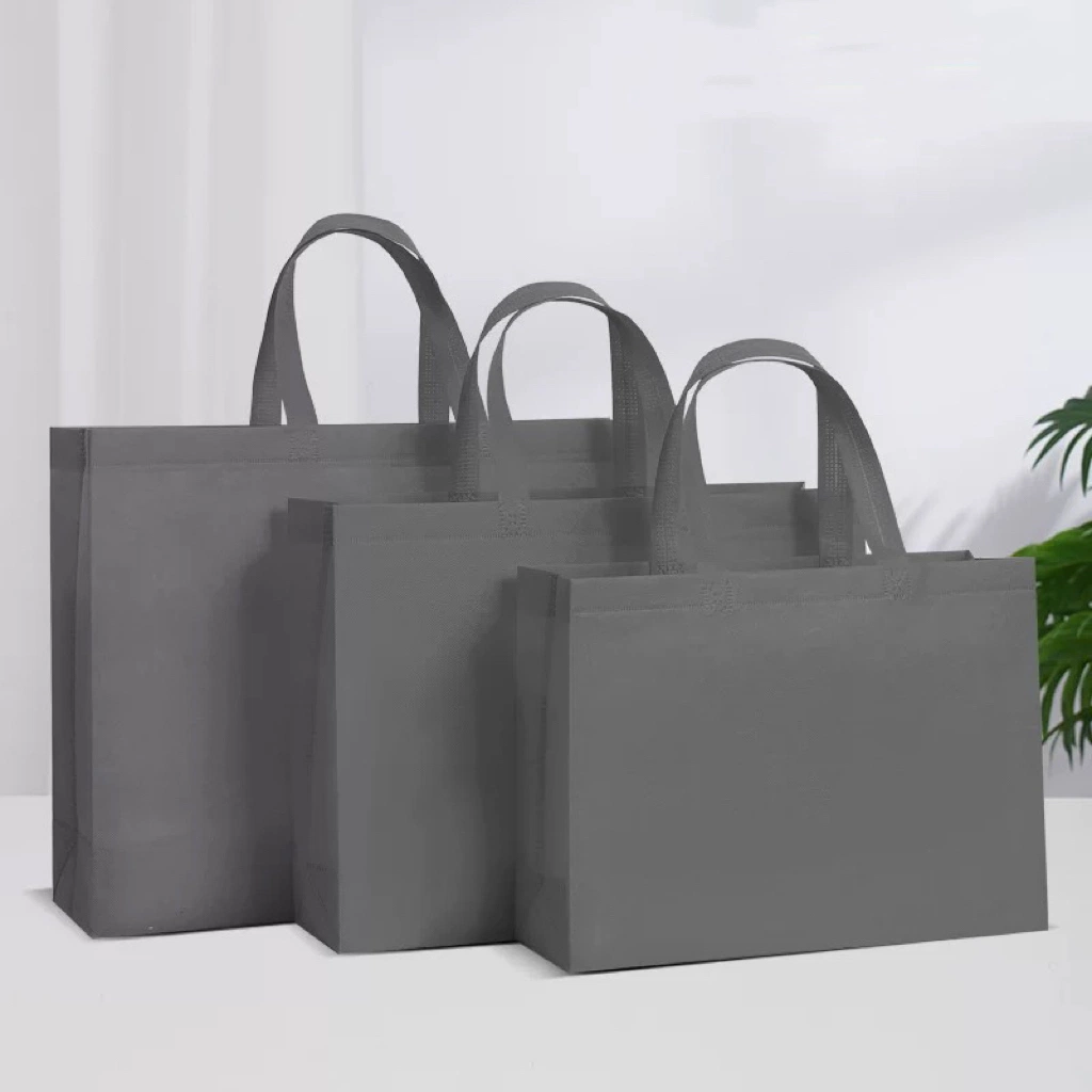 Telas laminadas Mayorista/Proveedors baratos almacenamiento de Nuevo estilo Bolsa de Compra no tejida Bolsas tejidas