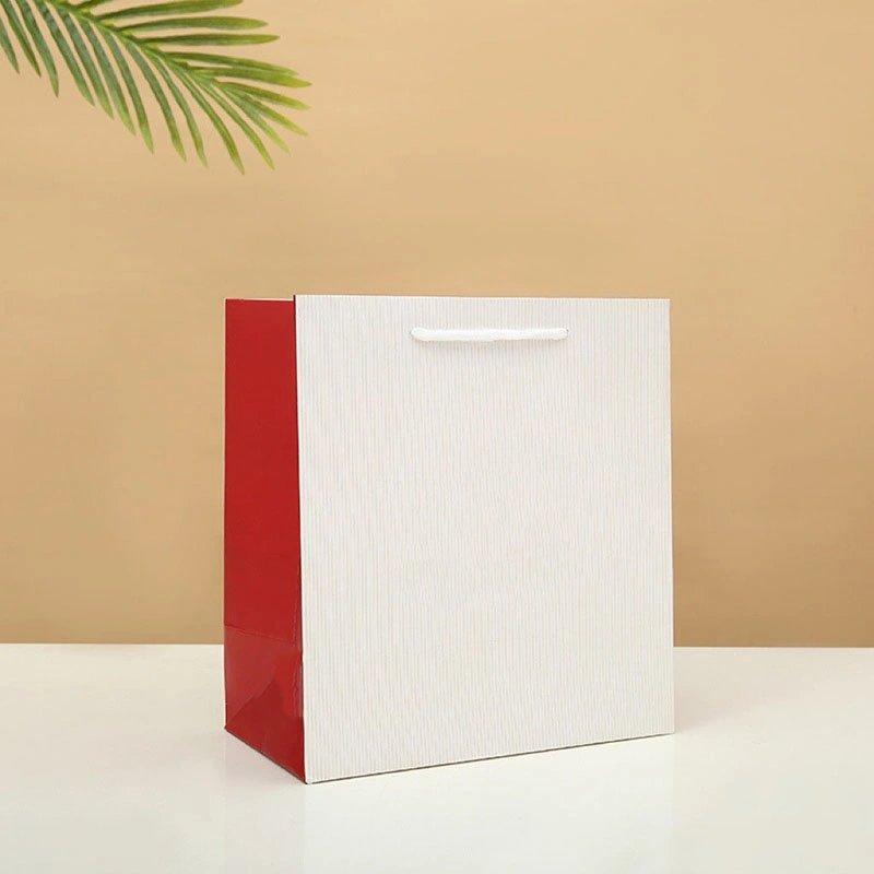 New Fashion Design White Ivory Board Paper Bag for Clothing High quality/High cost performance Cosmetic Paper Bag