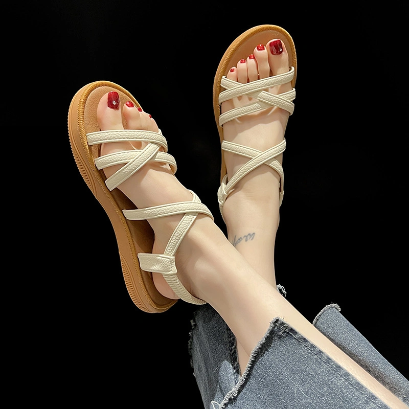 2023 Summer New Korean Version of Flat Sandals Female Elastic Strap Set Foot Cross Soft Sole Student Casual Sandals Wholesale/Supplier