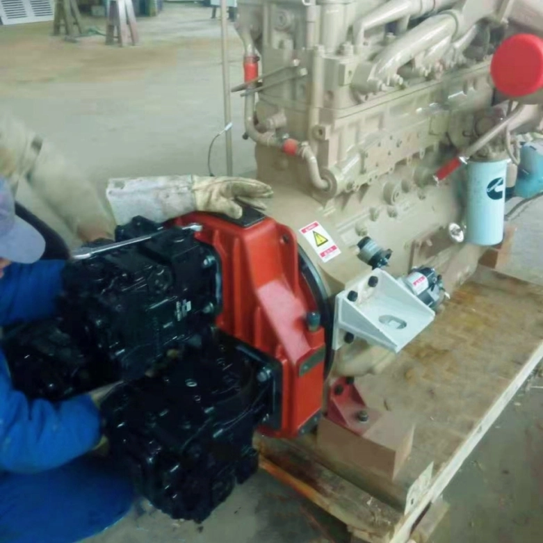 Cajas de engranajes de mando de la bomba, usadas para transferir la potencia y la rotación del motor a las bombas hidráulicas.