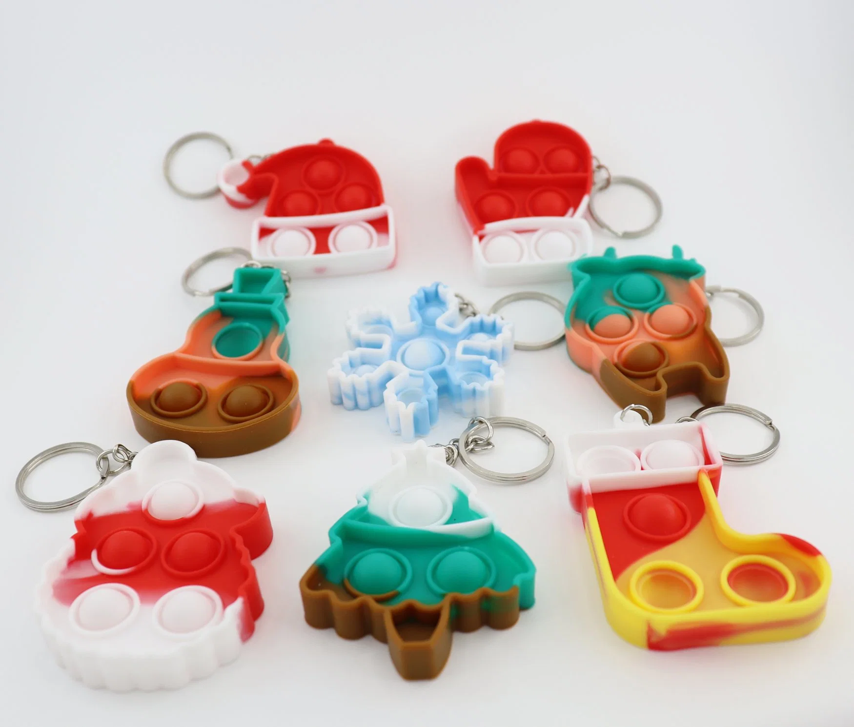 بيع كابسولة سيليكوني ميني عيد الميلاد اضغط البوب عيد الميلاد kidget المفتاح ألعاب فقاعة للأطفال