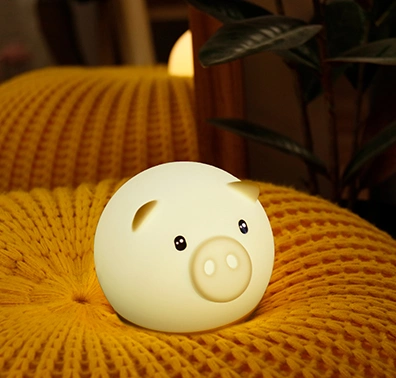 Version de batterie sèche de cochon rond 7 couleurs Lumière de bébé en silicone