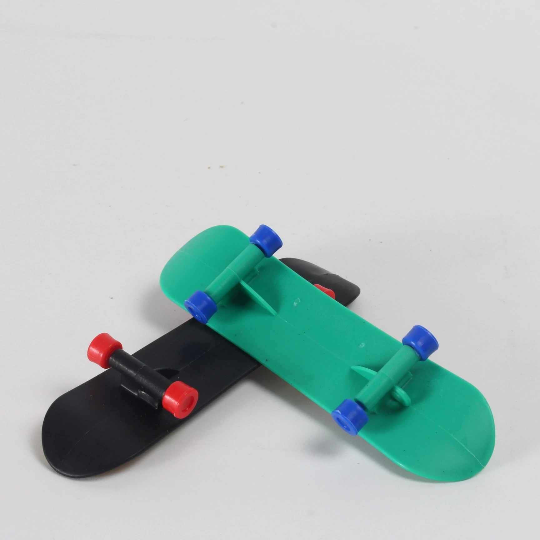 Creativos personalizados Newhot Fidget Diapasón Juegos Juguetes de plástico de skate Kid Mini de regalo de la Junta de dedo Finger skateboard Skate Truck