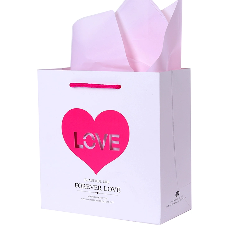 on Sale Stock Paper Gift Bags with Hollow out Love Design