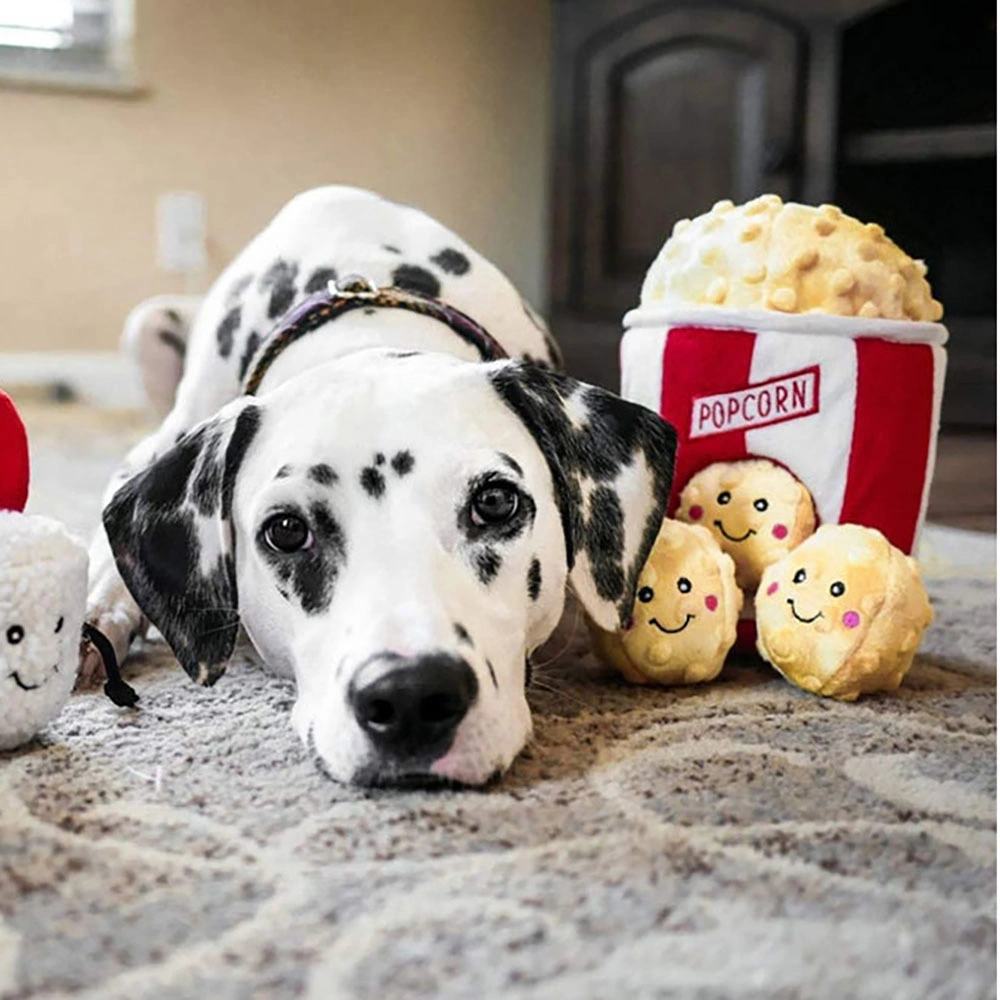 El sonido de la fuga de la felpa cubo de palomitas la herramienta de relevación de la mascota del perro Juguete