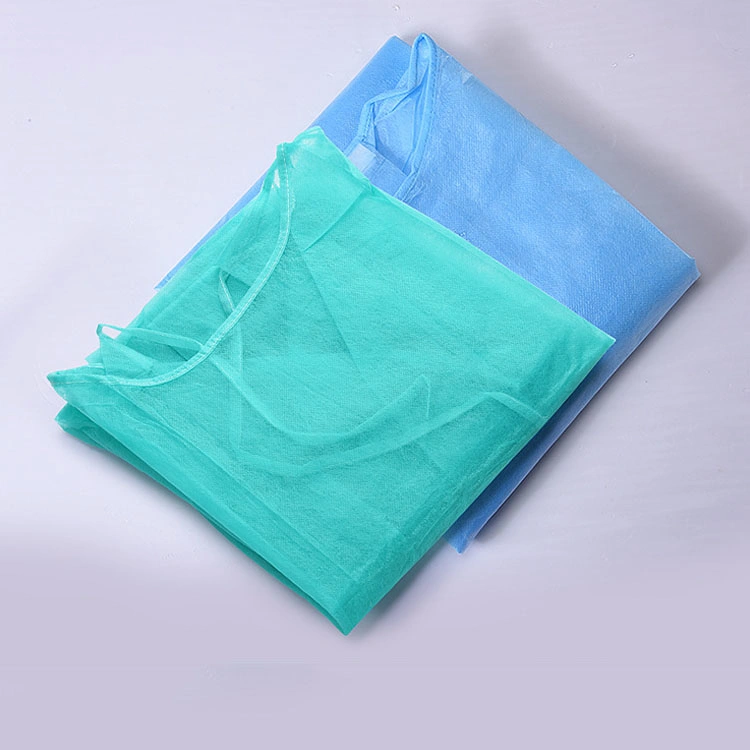 La vente directe d'usine PP Non-Woven isolation résistant au fluide robe bleue avec poignets tricotés